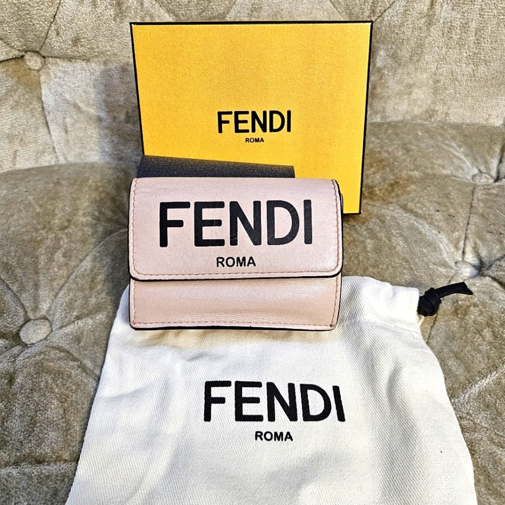 Authentic Fendi small compact wallet in light pink color
